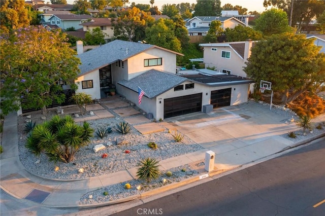 birds eye view of property with a residential view