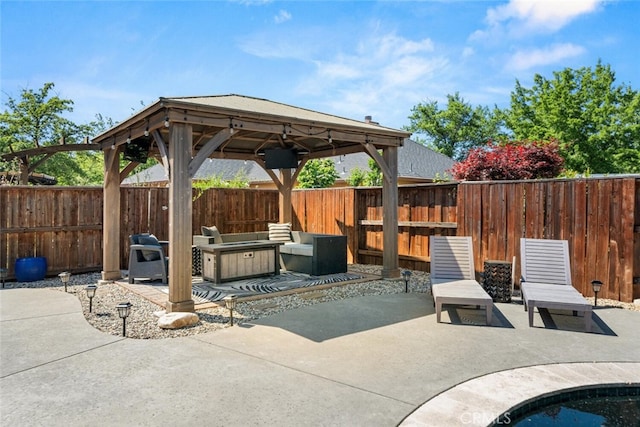 view of patio / terrace featuring a gazebo and a fenced backyard