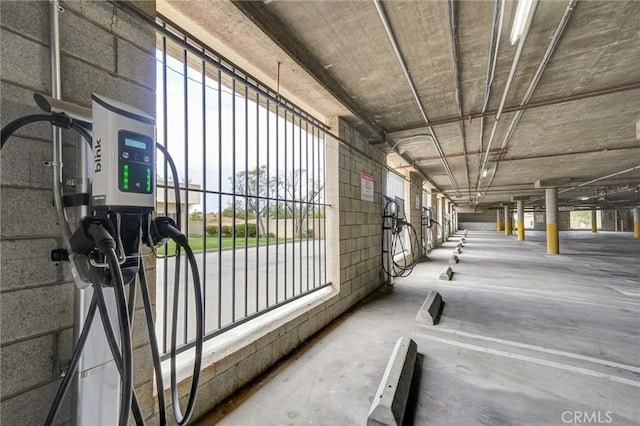 garage featuring concrete block wall