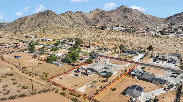 bird's eye view featuring view of desert and a mountain view
