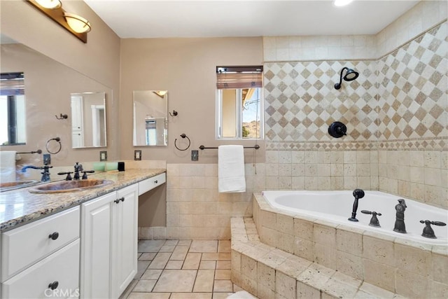 bathroom featuring tiled bath, tile patterned flooring, vanity, and a tile shower