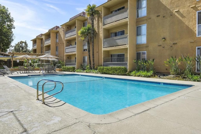 community pool featuring a patio