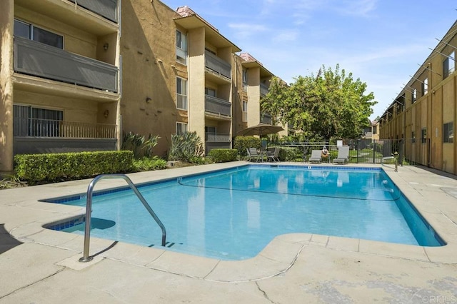 community pool with fence