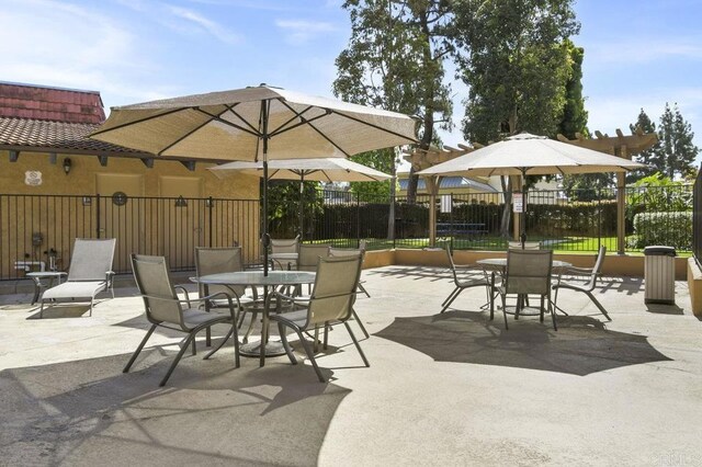 6955 Alvarado Rd Unit 30, San Diego, CA 92120 - view of patio / terrace featuring outdoor dining space