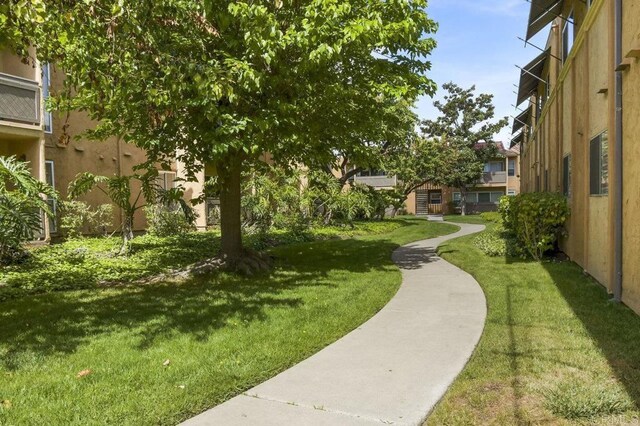 6955 Alvarado Rd Unit 30, San Diego, CA 92120 - view of home's community with a lawn