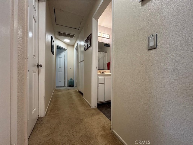 15957 Randall Ave Unit 34, Fontana, CA 92335 - hall featuring carpet flooring and a textured wall