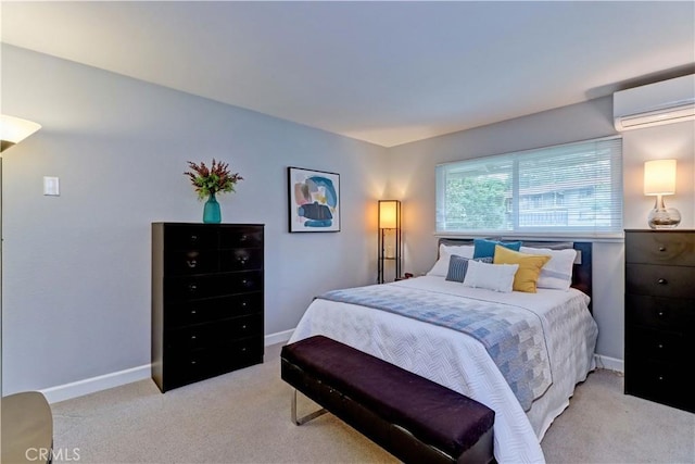 774 Via Los Altos Unit P, Laguna Woods, CA 92637 - bedroom with a wall mounted air conditioner, light colored carpet, and baseboards