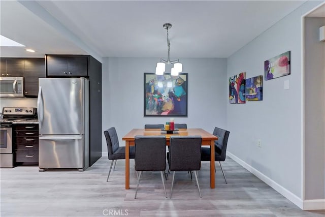 774 Via Los Altos Unit P, Laguna Woods, CA 92637 - dining area with a chandelier, baseboards, light wood-type flooring, and recessed lighting