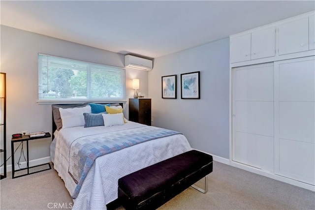 774 Via Los Altos Unit P, Laguna Woods, CA 92637 - bedroom with a wall unit AC and light colored carpet