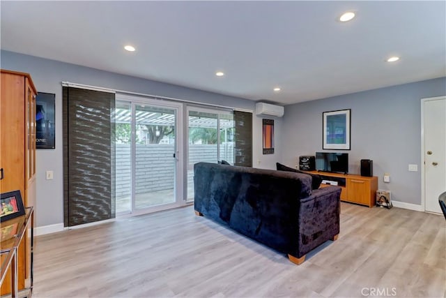 774 Via Los Altos Unit P, Laguna Woods, CA 92637 - living area featuring light wood finished floors, baseboards, recessed lighting, and a wall mounted air conditioner