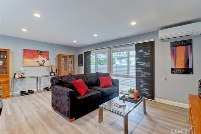 774 Via Los Altos Unit P, Laguna Woods, CA 92637 - living room with an AC wall unit, light wood-style floors, baseboards, and recessed lighting