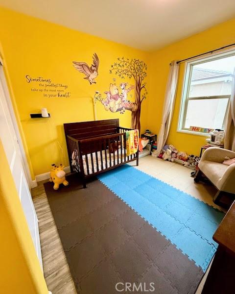 bedroom with a crib