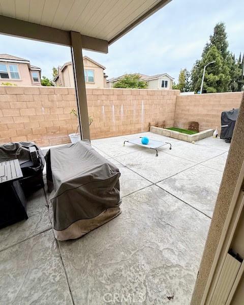 view of patio / terrace with a grill and a fenced backyard