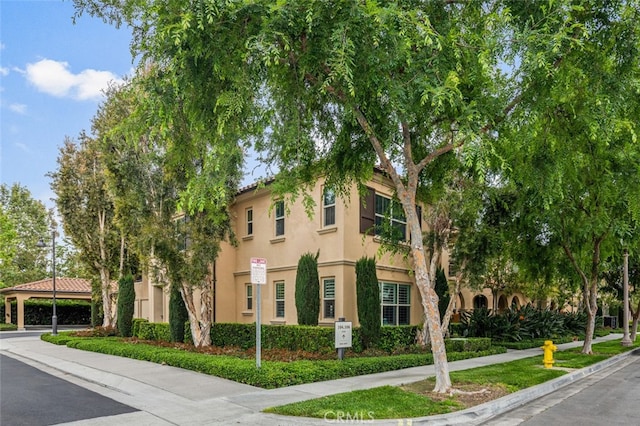 102 Rose Arch Unit 23, Irvine, CA 92620 - view of front of property featuring stucco siding