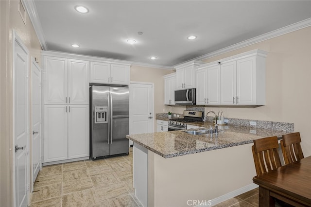 102 Rose Arch Unit 23, Irvine, CA 92620 - kitchen featuring stainless steel appliances, a sink, light stone counters, a peninsula, and white cabinets