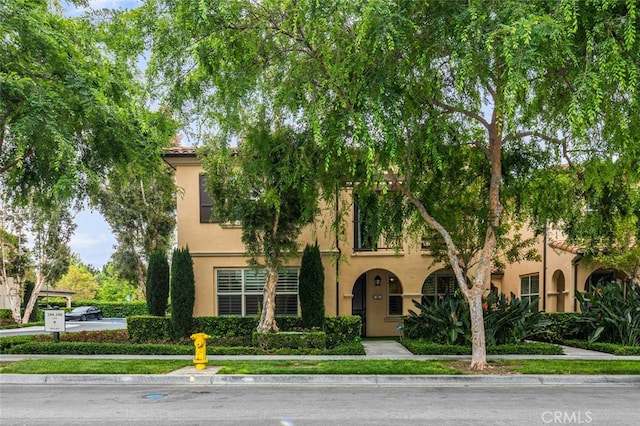 102 Rose Arch Unit 23, Irvine, CA 92620 - view of front of property with stucco siding