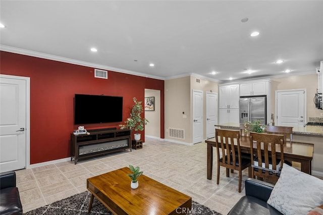 102 Rose Arch Unit 23, Irvine, CA 92620 - living room featuring recessed lighting, ornamental molding, and baseboards