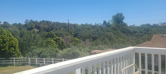balcony with a wooded view