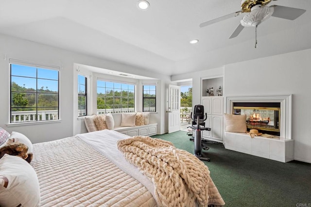 3048 Jason Rd, Fallbrook, CA 92028 - carpeted bedroom with multiple windows, a tiled fireplace, recessed lighting, and ceiling fan