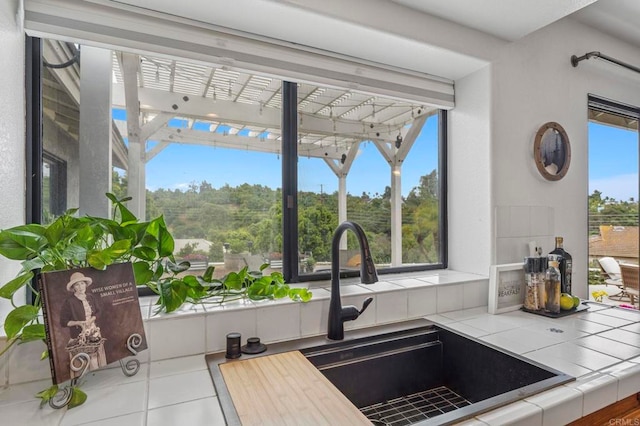3048 Jason Rd, Fallbrook, CA 92028 - kitchen featuring tile countertops, a sink, and tile patterned floors