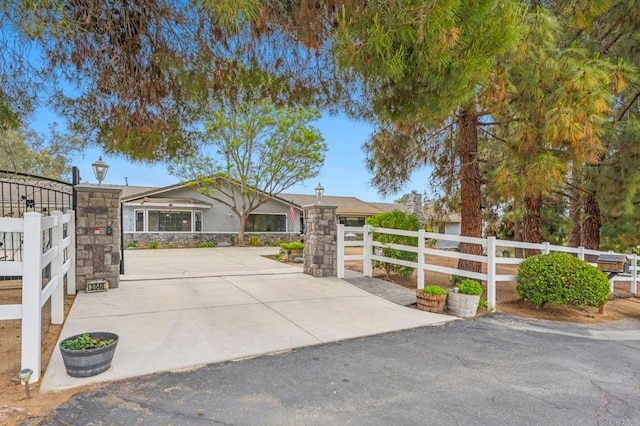 3048 Jason Rd, Fallbrook, CA 92028 - ranch-style home with a fenced front yard and stone siding