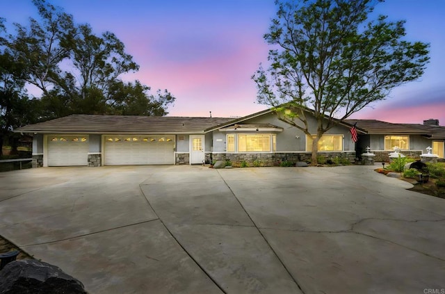 3048 Jason Rd, Fallbrook, CA 92028 - single story home featuring stone siding, concrete driveway, an attached garage, and stucco siding