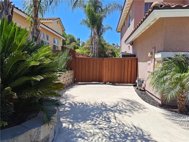 exterior space with fence and a gate