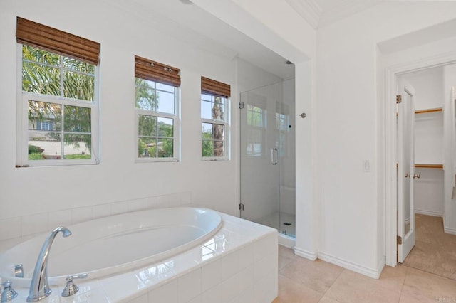 2705 Plumeria Dr, Carlsbad, CA 92009 - full bathroom with a shower stall, a spacious closet, a garden tub, and tile patterned flooring