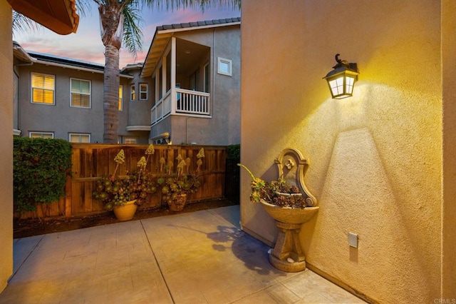 2705 Plumeria Dr, Carlsbad, CA 92009 - exterior space with fence, a patio, and stucco siding