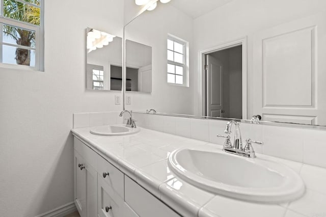 2705 Plumeria Dr, Carlsbad, CA 92009 - bathroom featuring a sink and double vanity