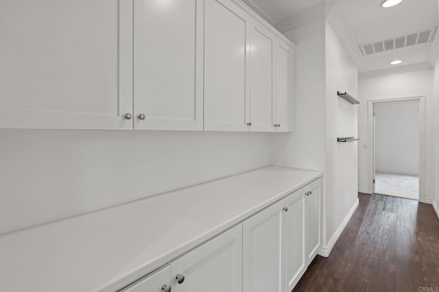 2705 Plumeria Dr, Carlsbad, CA 92009 - hallway with visible vents, recessed lighting, crown molding, dark wood-style flooring, and baseboards