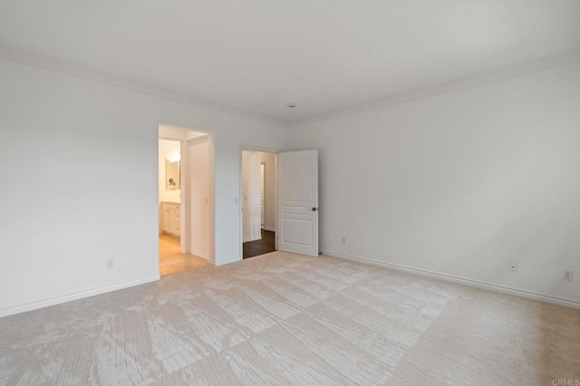 2705 Plumeria Dr, Carlsbad, CA 92009 - empty room with baseboards, crown molding, and light colored carpet