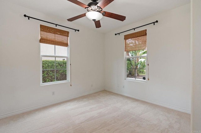 2705 Plumeria Dr, Carlsbad, CA 92009 - unfurnished room featuring light colored carpet, baseboards, and a ceiling fan