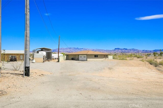 150020 Bluewater Rd, Big River, CA 92242 - view of yard featuring a detached carport, a shed, and a mountain view