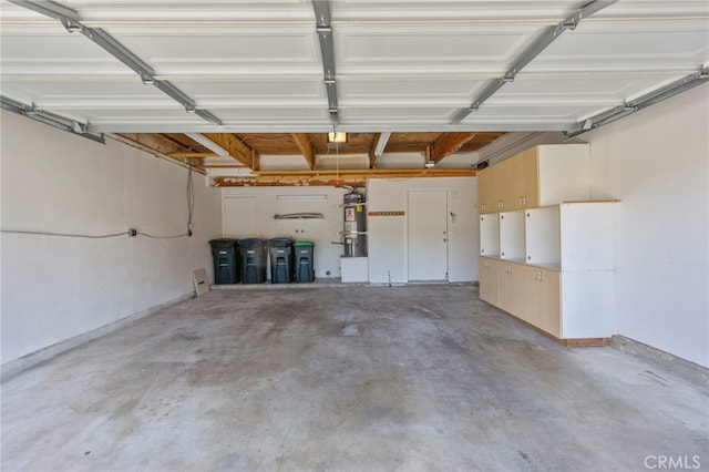 garage featuring baseboards