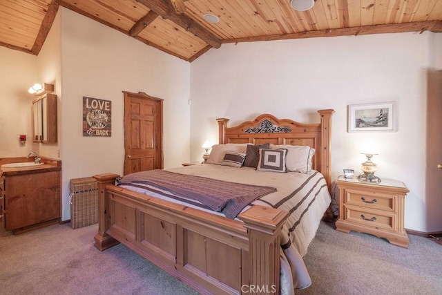 bedroom with wooden ceiling, light carpet, a sink, and vaulted ceiling with beams