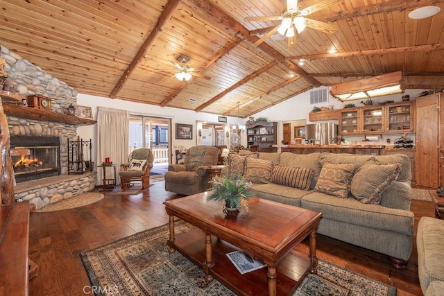 living room with a ceiling fan, wood-type flooring, visible vents, and wood ceiling
