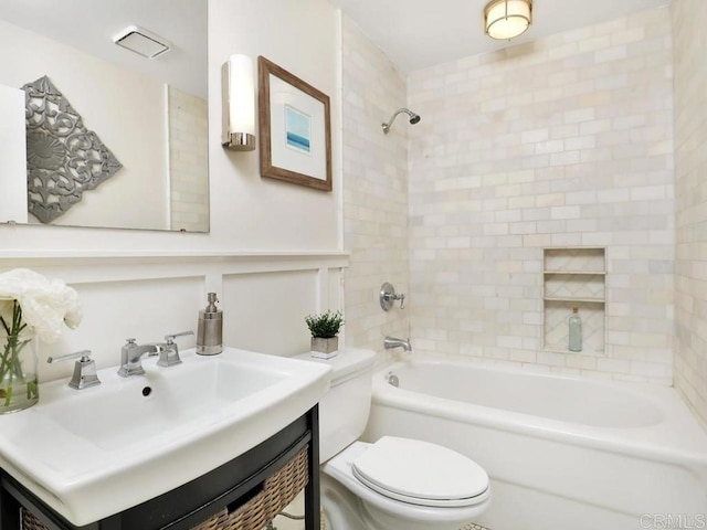 full bath with  shower combination, toilet, and vanity