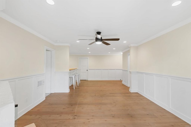 3527 Caminito Sierra Unit 202, Carlsbad, CA 92009 - empty room with ceiling fan, wainscoting, a decorative wall, recessed lighting, and ornamental molding