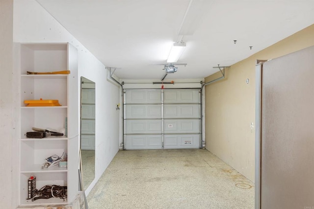 3527 Caminito Sierra Unit 202, Carlsbad, CA 92009 - garage featuring a garage door opener