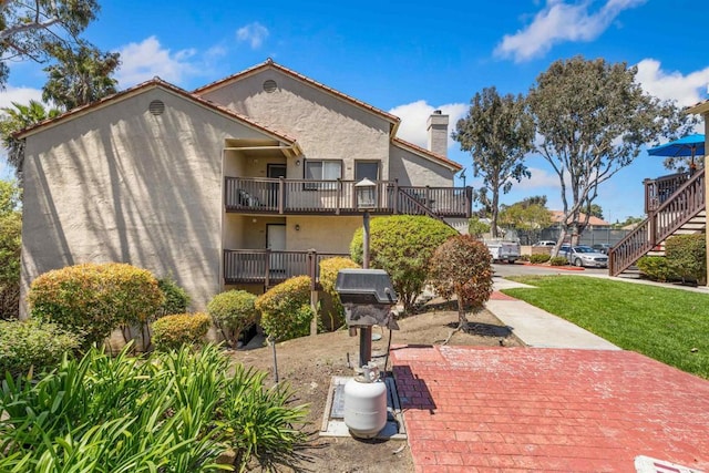 3527 Caminito Sierra Unit 202, Carlsbad, CA 92009 - view of building exterior with stairs