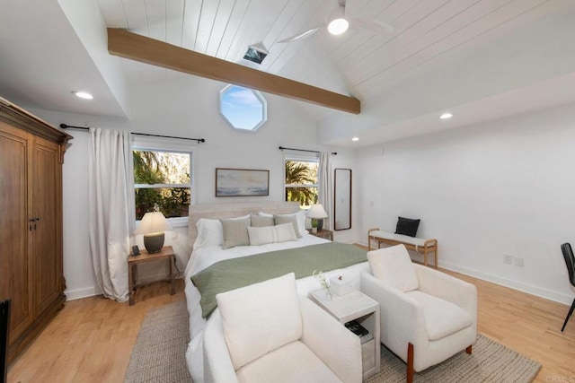 bedroom featuring multiple windows, light wood-style flooring, lofted ceiling, and recessed lighting