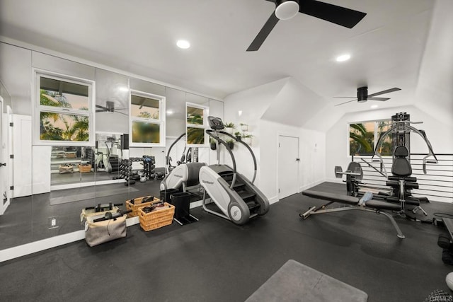 workout area featuring a healthy amount of sunlight, vaulted ceiling, ceiling fan, and recessed lighting