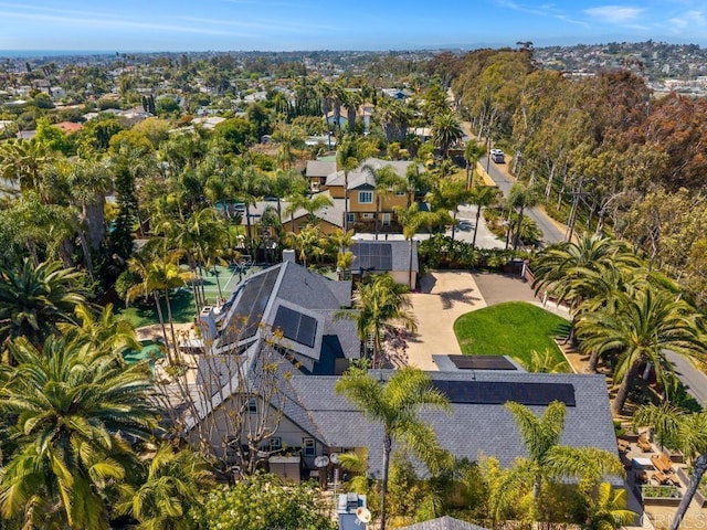 birds eye view of property with a residential view
