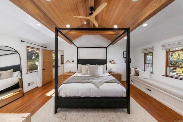 bedroom featuring lofted ceiling with beams, recessed lighting, wood ceiling, and wood finished floors