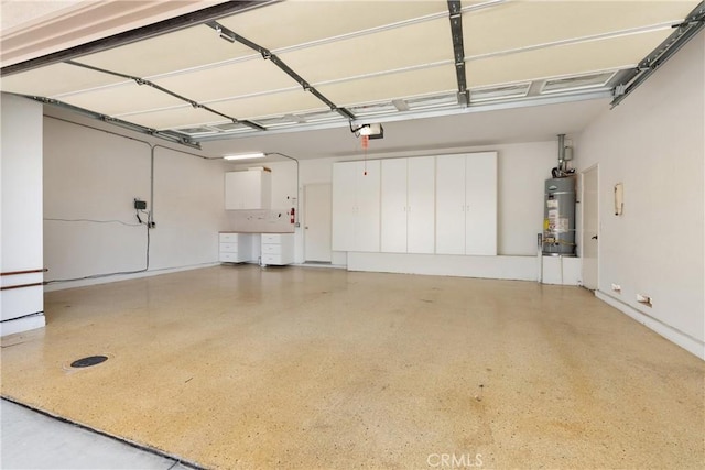 40050 Corte Fortuna, Murrieta, CA 92562 - garage with water heater and a garage door opener