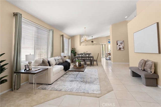 40050 Corte Fortuna, Murrieta, CA 92562 - living room featuring a chandelier, vaulted ceiling, baseboards, and light tile patterned flooring