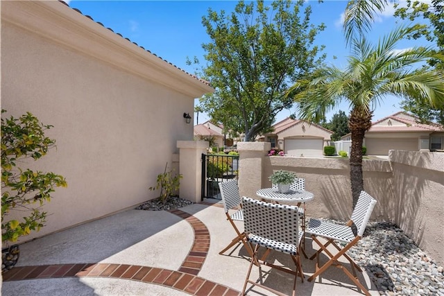40050 Corte Fortuna, Murrieta, CA 92562 - view of patio / terrace featuring fence and a gate