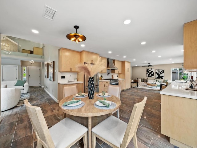 dining area with a ceiling fan, visible vents, and recessed lighting
