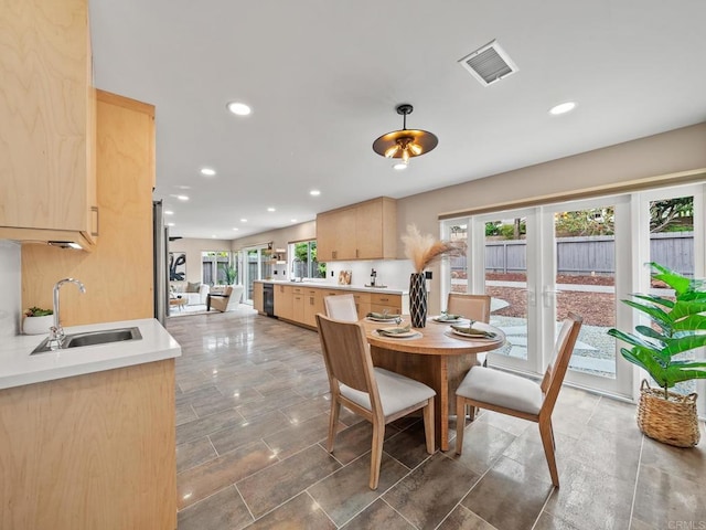 dining space with recessed lighting, french doors, and visible vents